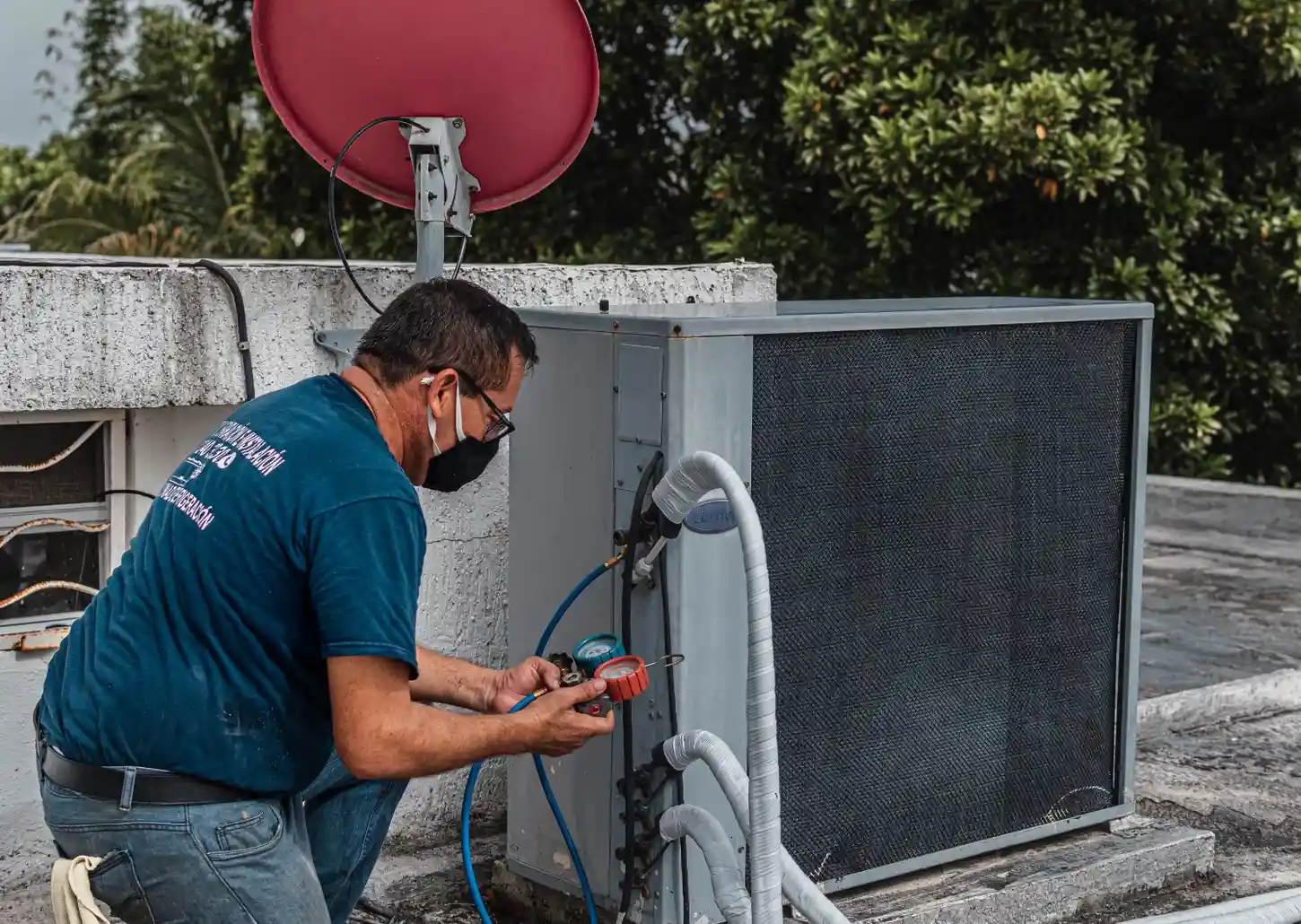 Technician testing HVAC electrical components with a multimeter in Summerville, SC. HVAC Contractor near me